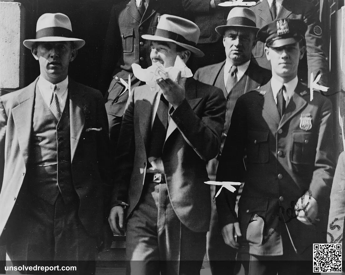 Vincent Coll leaving homicide court surrounded by police officers
