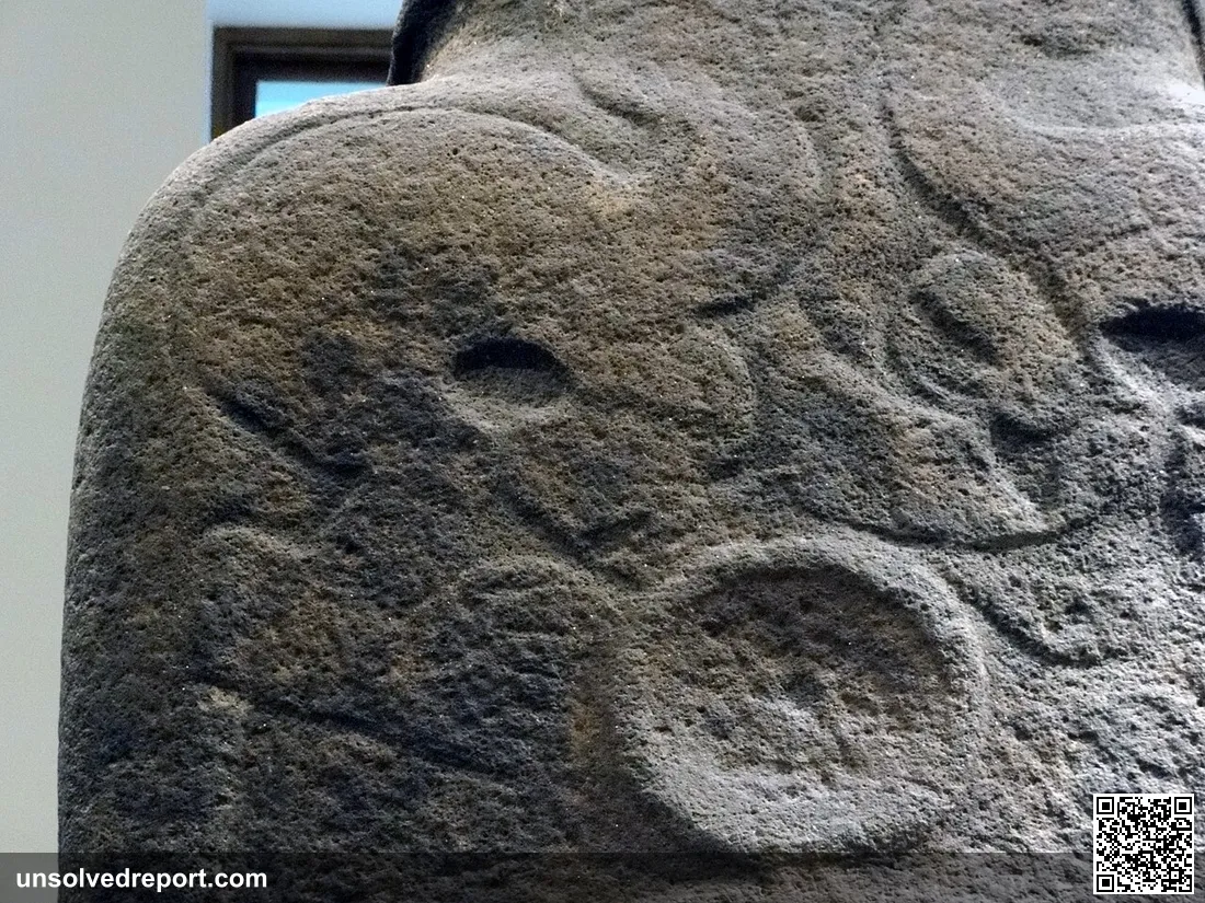 Close up showing detail of carvings in the left shoulder of the British Museum Hoa Hakananai'a statue.