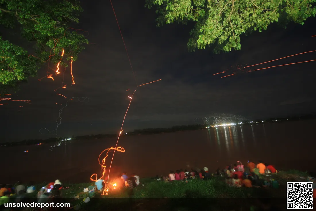 Bung Fai Phaya Nak fireball emerging from the Mekong River during the annual Bang Fai Phaya Nak festival at Nong Khai, Thailand
