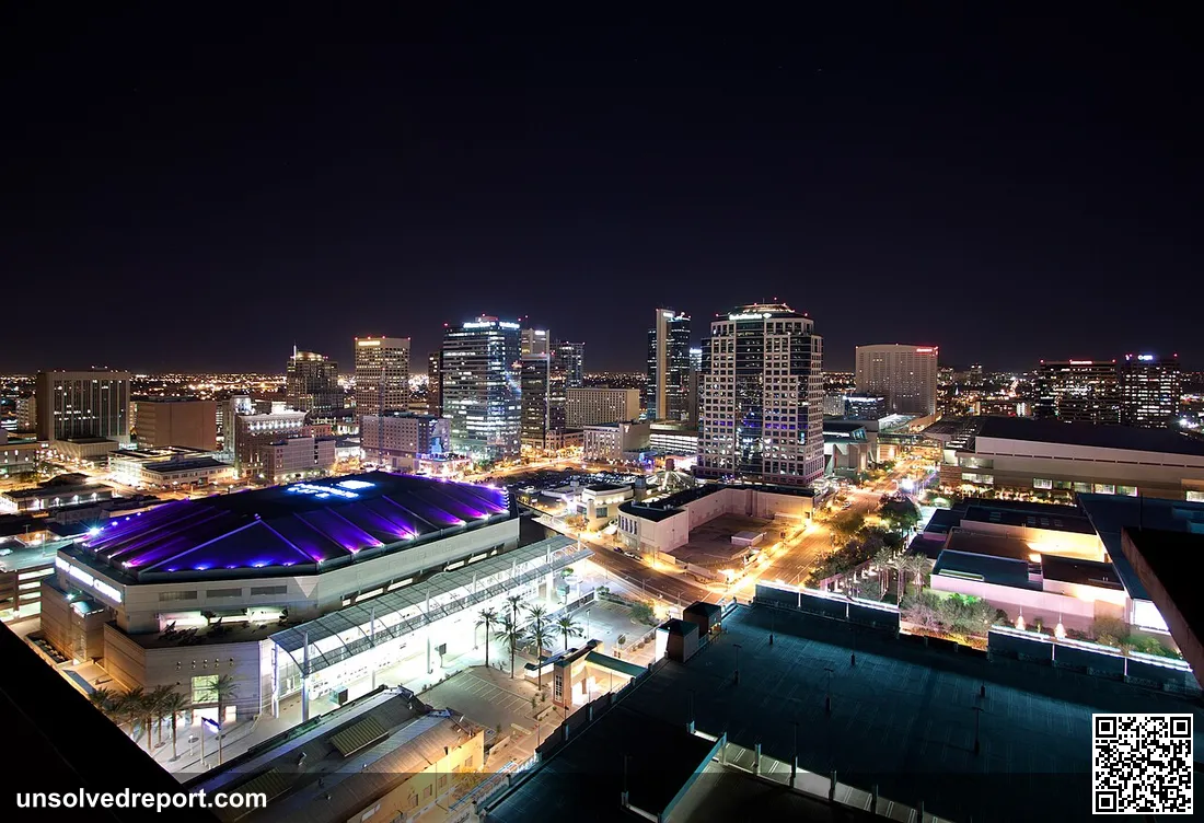 Downtown Phoenix, Arizona skyline at night as seen from on top of the Summit at Copper Square condos.