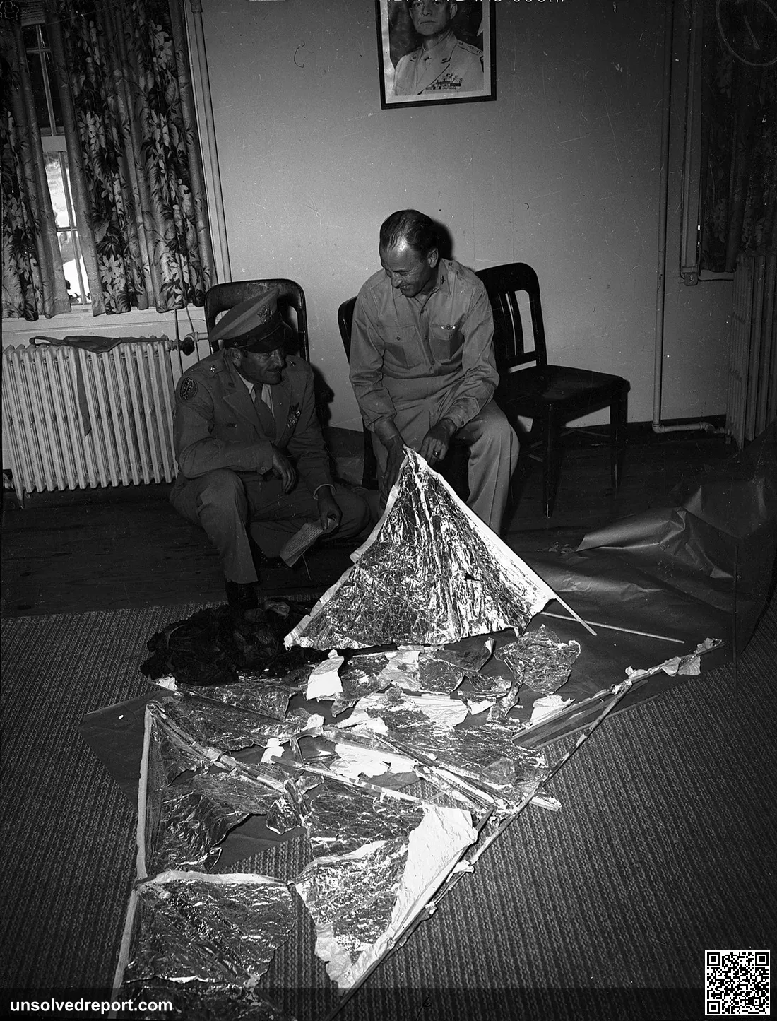 Fort Worth Army-Air Force -- Brig. General Roger Ramey, left, holding telegram, and Col. Thomas J. DuBose looking over …