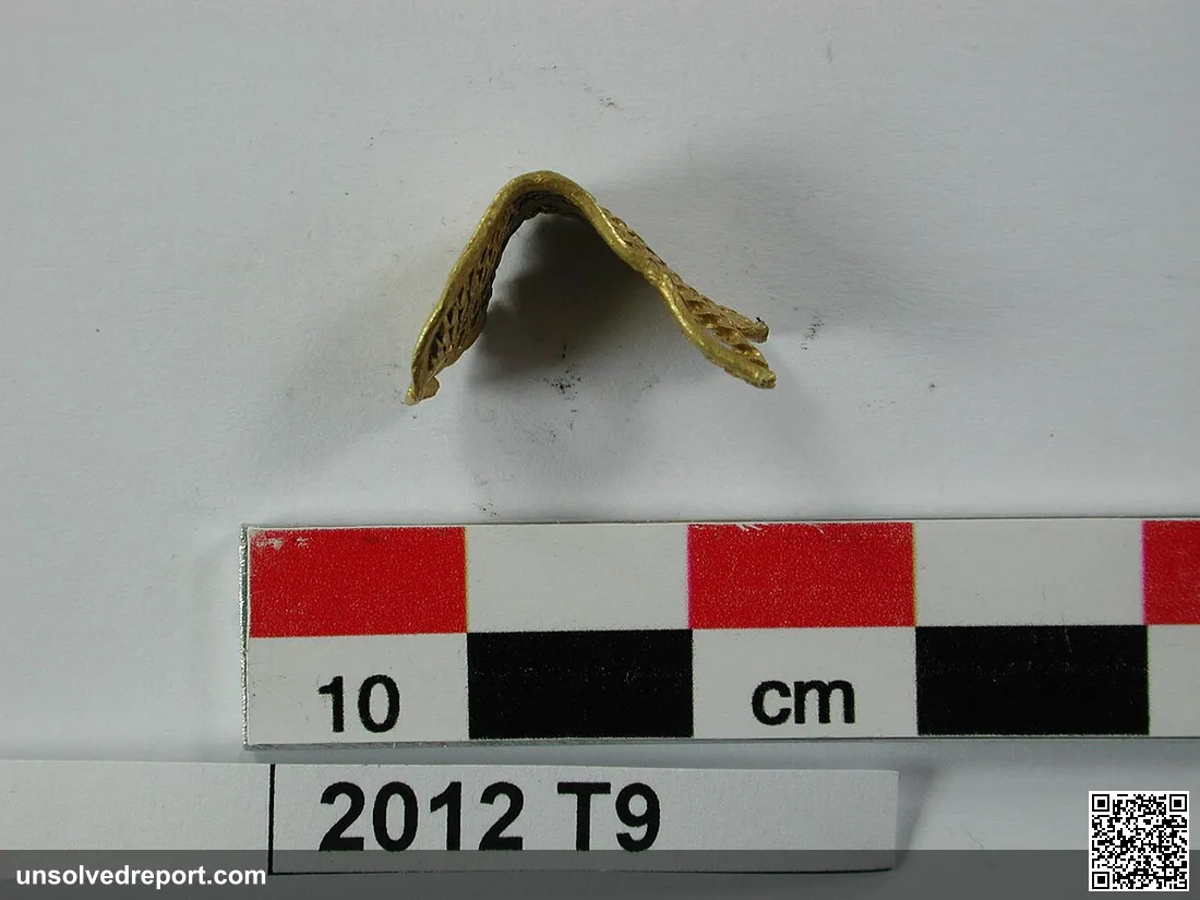 Description: Fragment of flat object, probably a Bronze Age bracelet. It is neatly made from five lengths of gold strip…