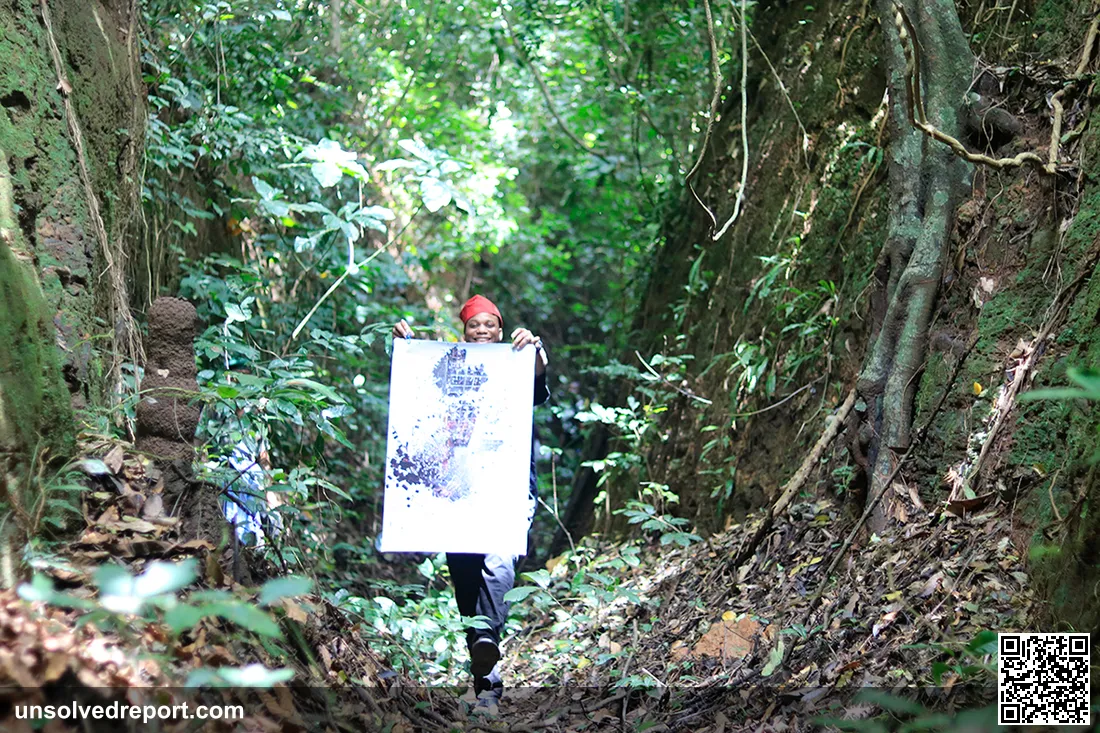 Multidisciplinary technologist Ade Olufeko inside world heritage site Sungbo's Eredo with heirloom Philosophers Legacy